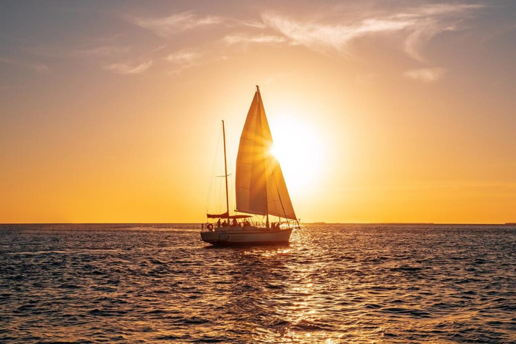 Relaxing on a sailboat without digital distractions during a weekend getaway.
