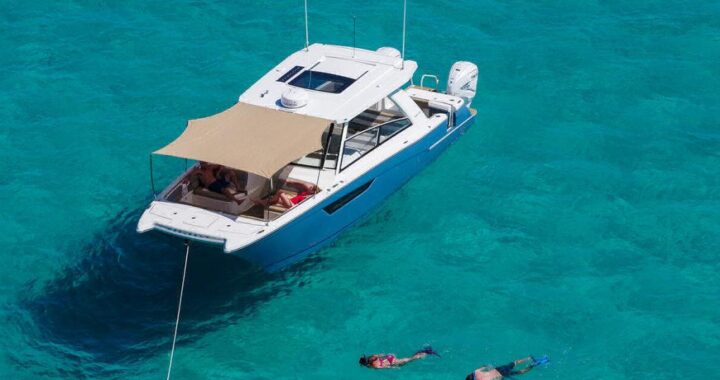 A guided boat snorkeling tour in crystal-clear Mediterranean waters.