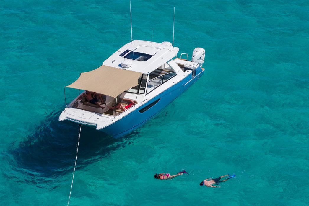 A guided boat snorkeling tour in crystal-clear Mediterranean waters.