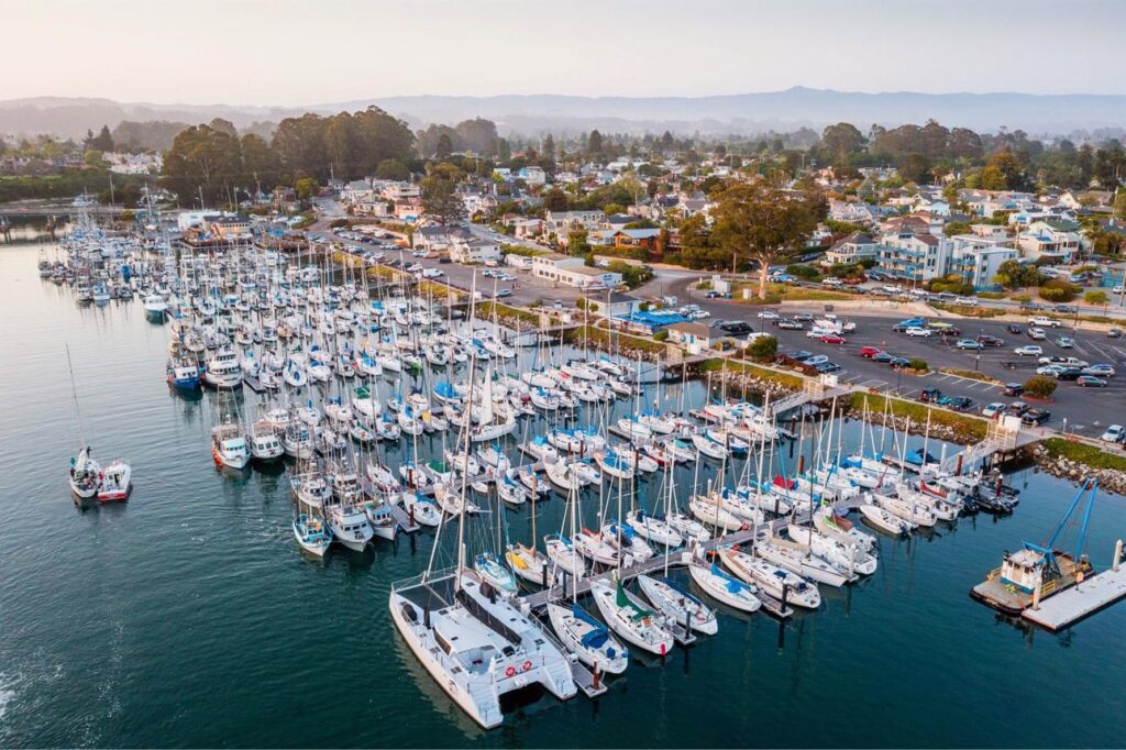 Santa Cruz Harbor in California with boats moored along Monterey Bay.