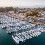 Santa Cruz Harbor in California with boats moored along Monterey Bay.