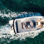 Modern water taxi transporting tourists across crystal-clear Adriatic waters between coastal destinations.