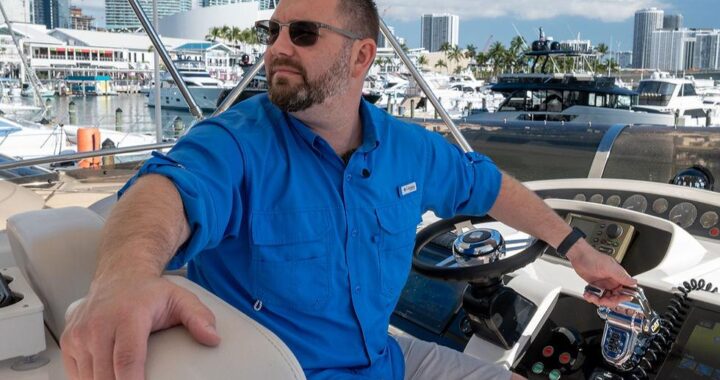 Professional boat captain working on a charter yacht in Florida marina, representing boat crew jobs in the USA in 2026.