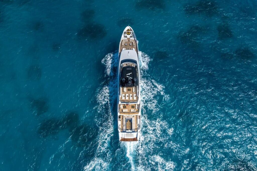 A luxury yacht gliding across the turquoise waters of the Côte d’Azur.