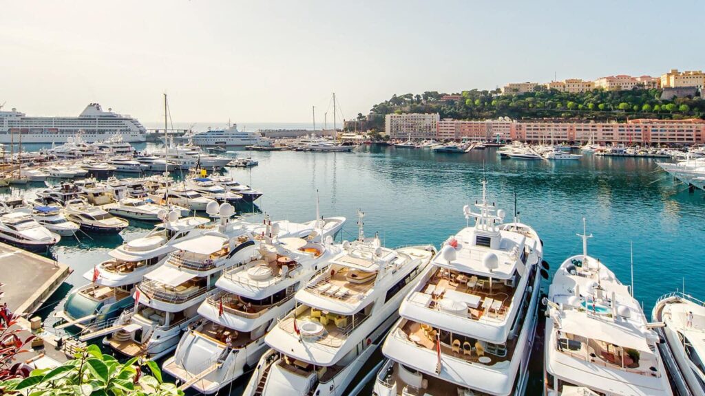 Private boats moored in a Mediterranean marina as owners generate income through boat rentals.