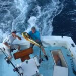 An offshore sportfishing boat pursuing pelagic fish in the Florida Keys.