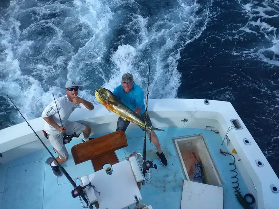 An offshore sportfishing boat pursuing pelagic fish in the Florida Keys.