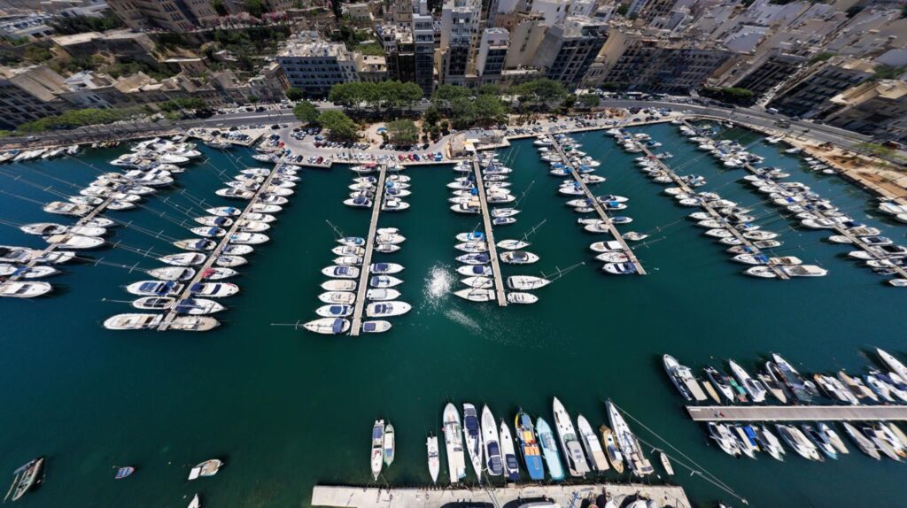 Busy marina with commercial and leisure boats illustrating opportunities for water transport services.
