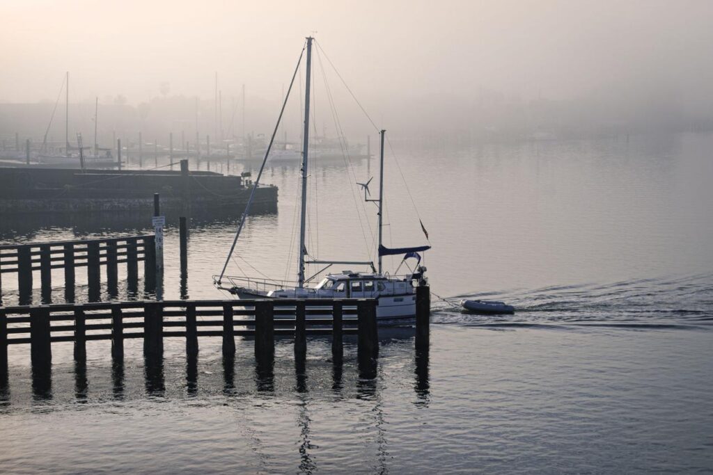 Boat leaving the marina at sunrise for a relaxing weekend on the water.